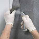 Remove excess adhesive and trim the excess membrane